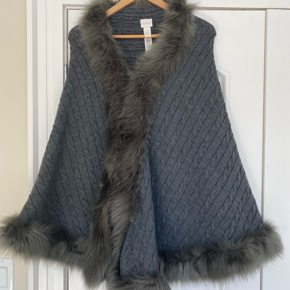 Grey colored poncho with faux fur trim by Chicos